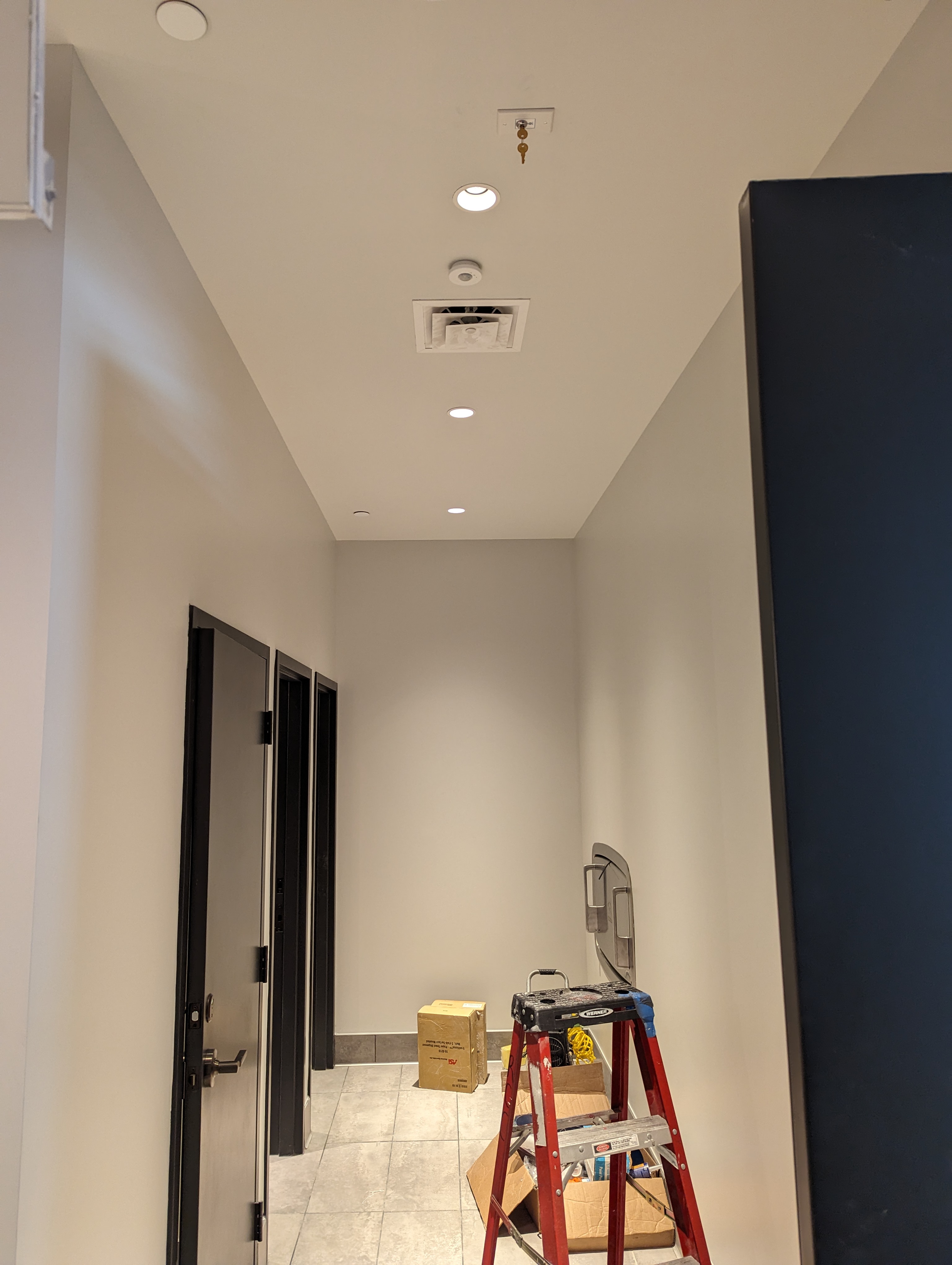 Recessed can light installation in a commercial space